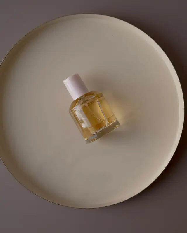 Perfume bottle on a tray