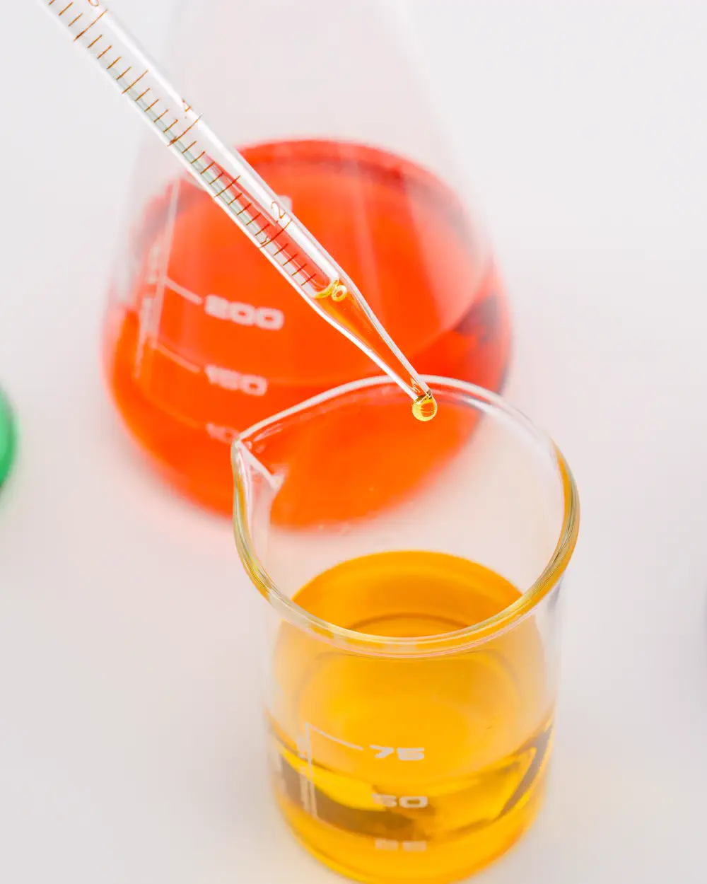 Pipette transferring liquid into a beaker