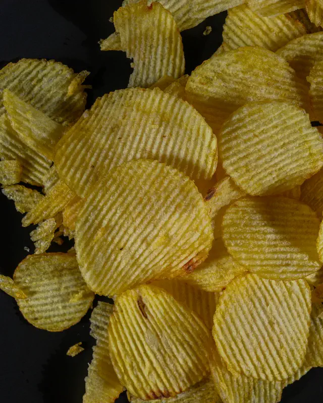 Seasoned ridged crisps, close up