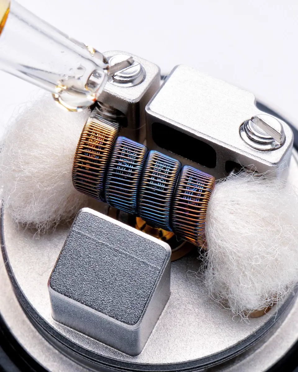 Vape hardware on a dark surface